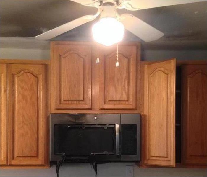 Same cabinets after they were cleaned and didn't need to be replaced